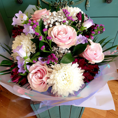 Country Whispers - A sweetly scented hand-tied featuring Peonies with a fine company of beautifully selected flowers. Make their day with a one-of-a-kind arrangement that promises to deliver.